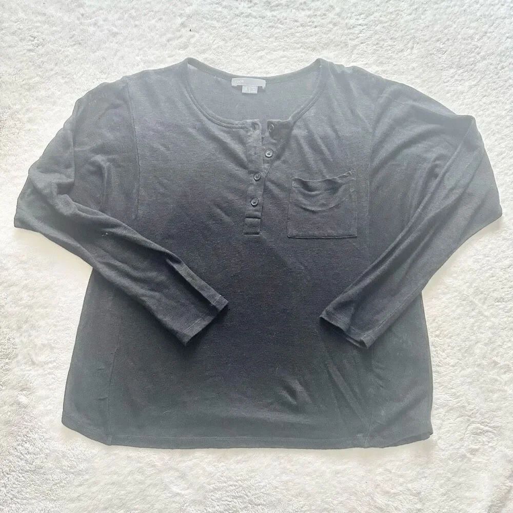 Black long sleeve womenโs Henley shirt with singleโpocket size small
